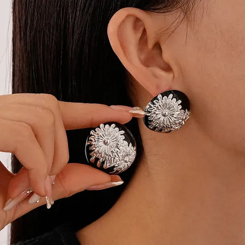 Flower embossed earring